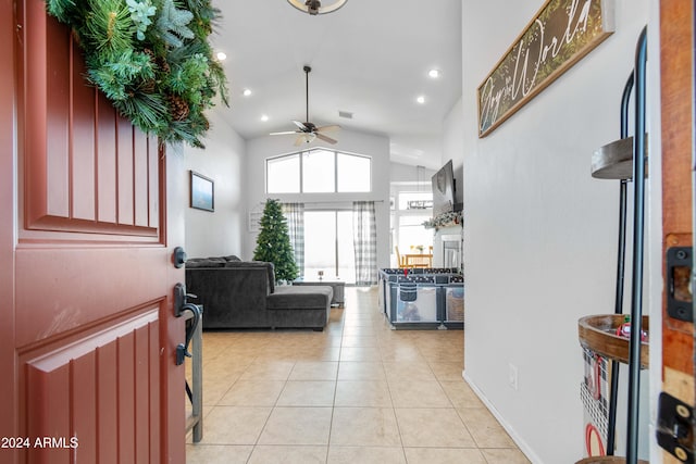 interior space featuring vaulted ceiling and ceiling fan