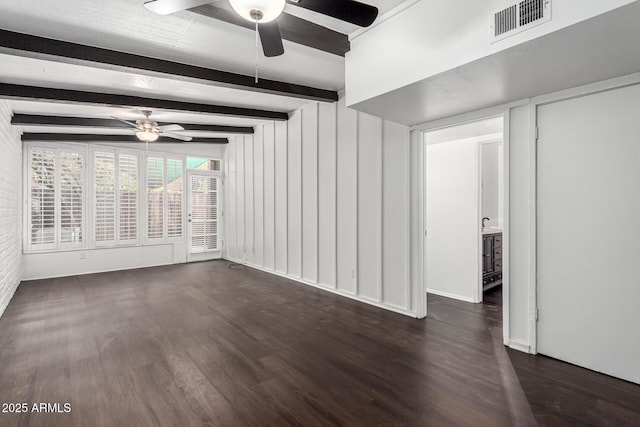 3046 N 32nd St Unit 328, Phoenix, AZ 85018 - unfurnished living room with wood finished floors, beamed ceiling, a ceiling fan, and visible vents