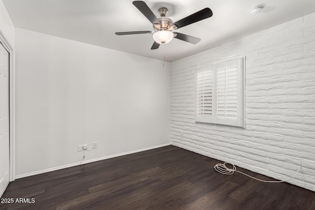 3046 N 32nd St Unit 328, Phoenix, AZ 85018 - unfurnished room featuring baseboards, a ceiling fan, and dark wood-style flooring