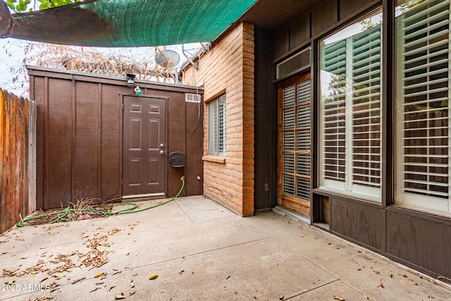 3046 N 32nd St Unit 328, Phoenix, AZ 85018 - property entrance with a patio and fence