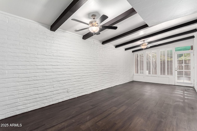 3046 N 32nd St Unit 328, Phoenix, AZ 85018 - interior space featuring vaulted ceiling with beams, brick wall, dark wood-style flooring, and a ceiling fan