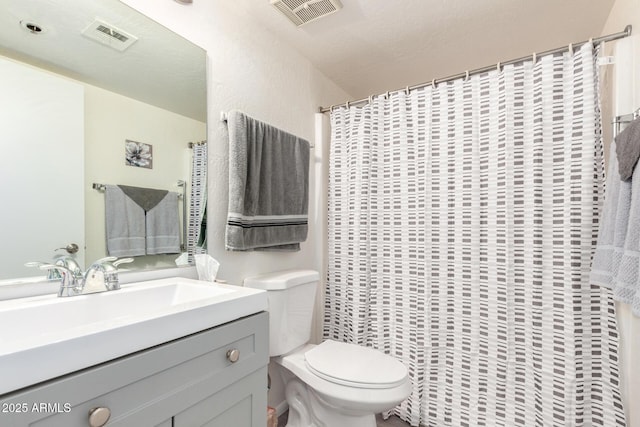 12123 W Bell Rd Unit 339, Surprise, AZ 85378 - full bath with visible vents, toilet, and vanity