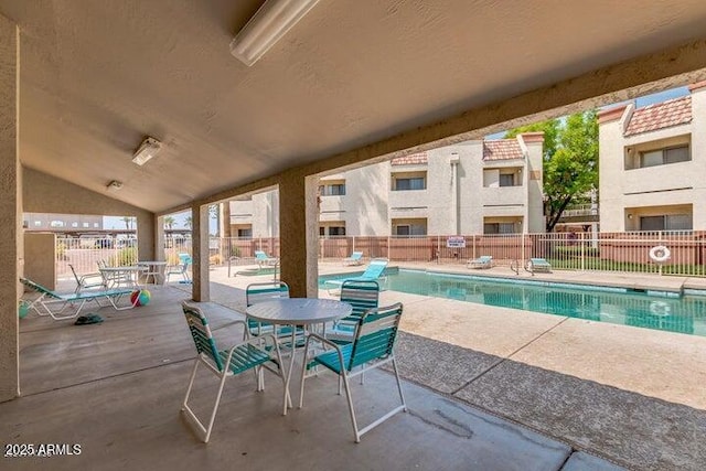 12123 W Bell Rd Unit 339, Surprise, AZ 85378 - community pool featuring a patio and fence