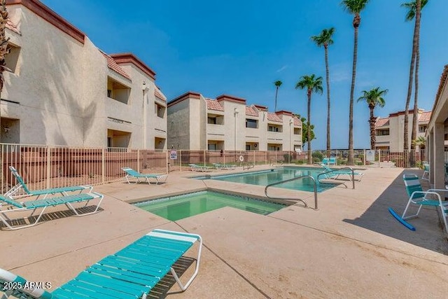 12123 W Bell Rd Unit 339, Surprise, AZ 85378 - community pool with fence and a patio