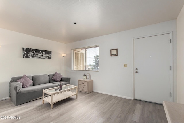 12123 W Bell Rd Unit 339, Surprise, AZ 85378 - living area with baseboards and light wood-style floors