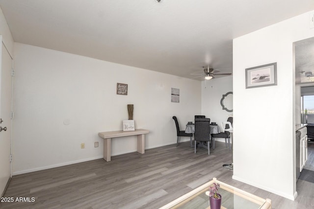 12123 W Bell Rd Unit 339, Surprise, AZ 85378 - interior space with baseboards, ceiling fan, and light wood finished floors