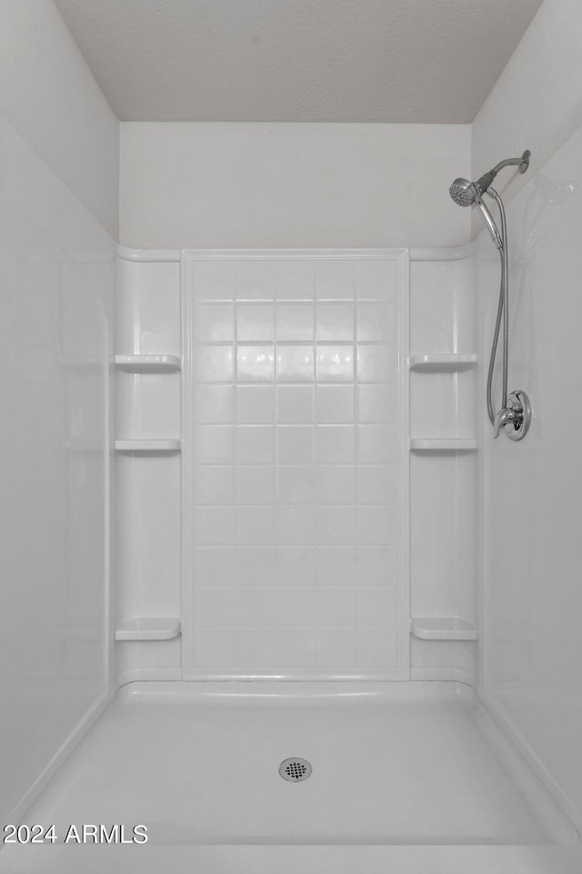 bathroom with walk in shower