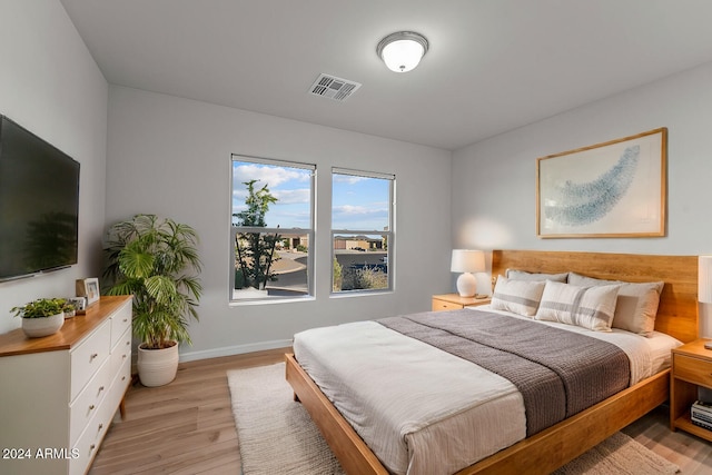 bedroom featuring light hardwood / wood-style flooring