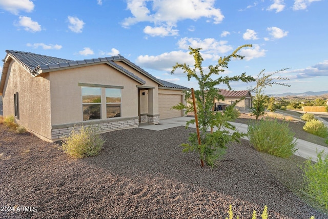 view of front of home featuring a garage