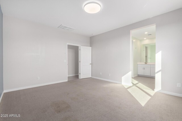1523 S 223rd Dr, Buckeye, AZ 85326 - unfurnished bedroom with light colored carpet and baseboards