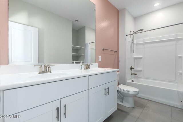 1523 S 223rd Dr, Buckeye, AZ 85326 - bathroom featuring double vanity, tile patterned flooring, toilet,  shower combination, and recessed lighting