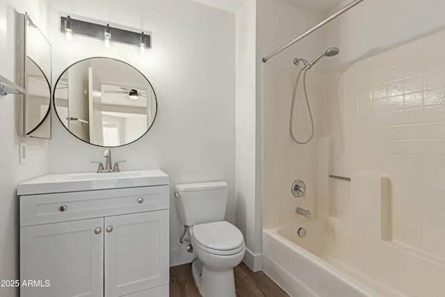 2455 E Broadway Rd Unit 39, Mesa, AZ 85204 - full bath with wood finished floors, toilet, vanity, shower / bath combination, and baseboards