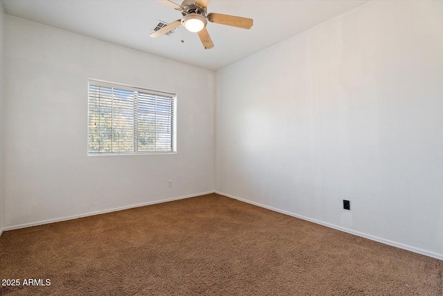 empty room featuring carpet flooring and ceiling fan