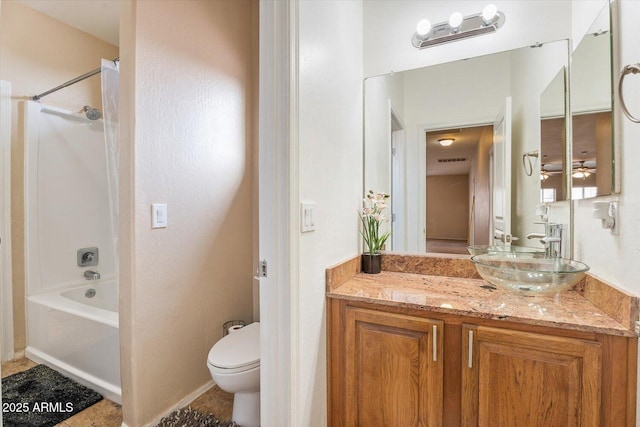 full bathroom featuring vanity, shower / tub combination, and toilet