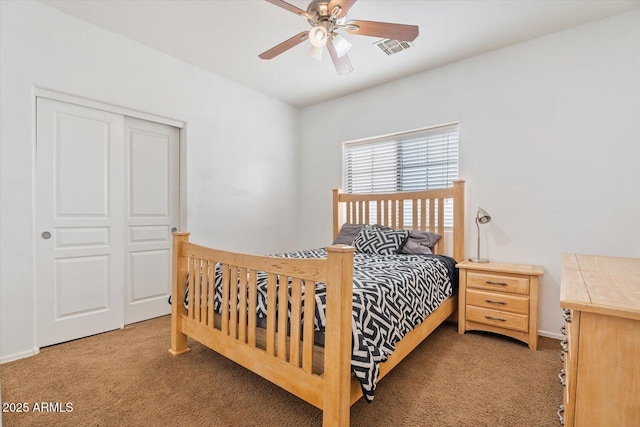 carpeted bedroom with ceiling fan