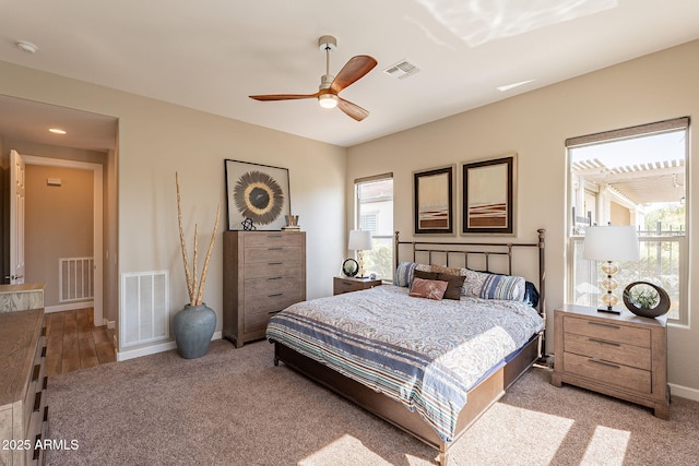 35756 N Clementine Trl, San Tan Valley, AZ 85140 - carpeted bedroom featuring baseboards, a ceiling fan, and visible vents