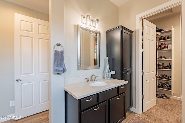 35756 N Clementine Trl, San Tan Valley, AZ 85140 - bathroom featuring a spacious closet and vanity