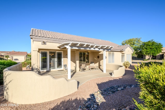 back of house featuring a patio