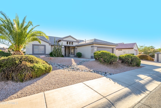 view of front of property with a garage