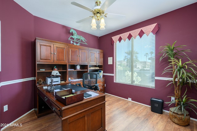 office space with light hardwood / wood-style flooring and ceiling fan