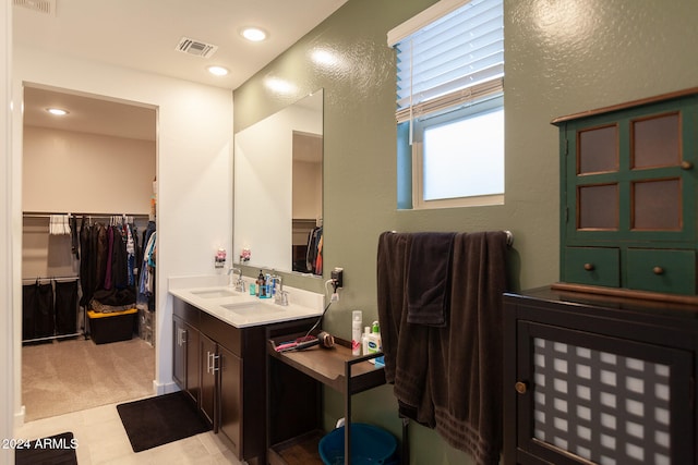 bathroom featuring vanity and tile patterned flooring