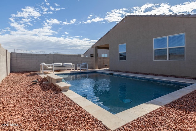 view of swimming pool featuring outdoor lounge area and a patio area