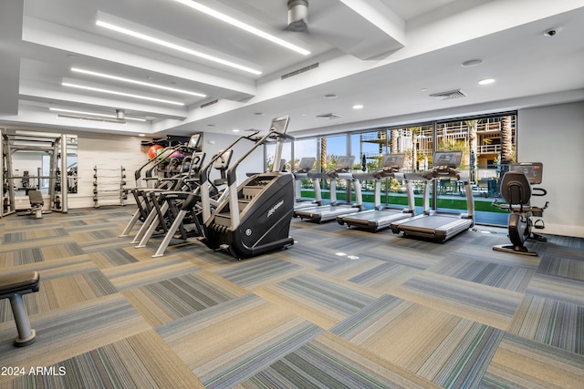 exercise room with carpet floors