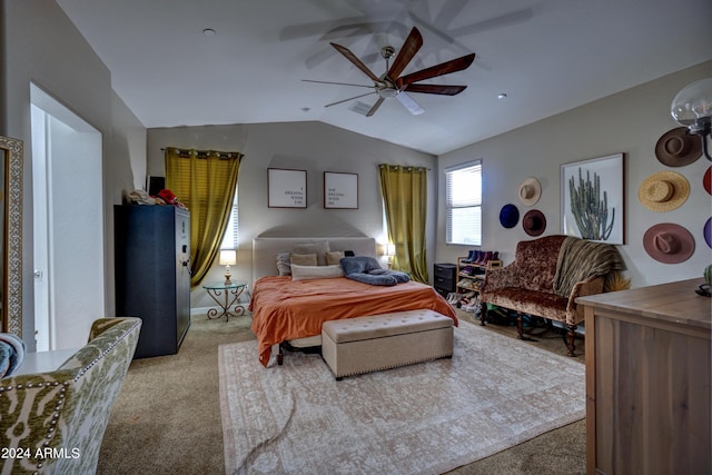 bedroom featuring ceiling fan, light carpet, and vaulted ceiling