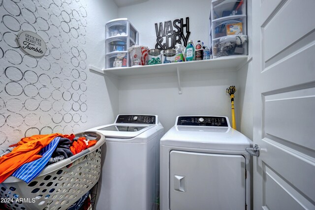 laundry area with washer and clothes dryer