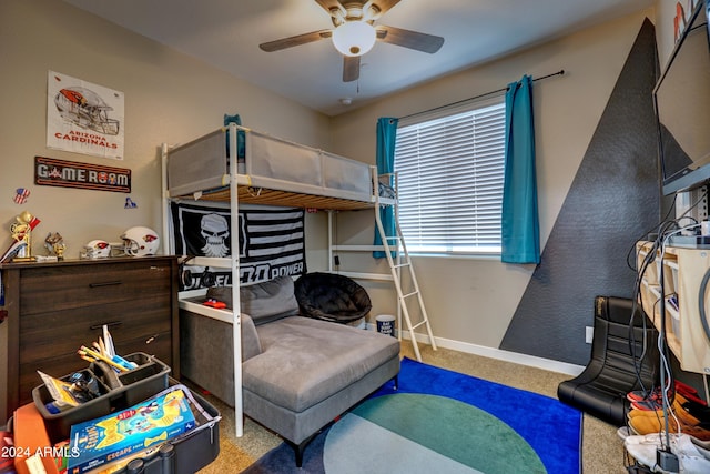 bedroom featuring light colored carpet and ceiling fan