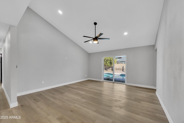 unfurnished living room with lofted ceiling, light hardwood / wood-style flooring, and ceiling fan