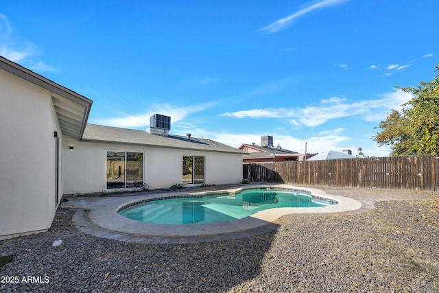 view of pool featuring central AC unit