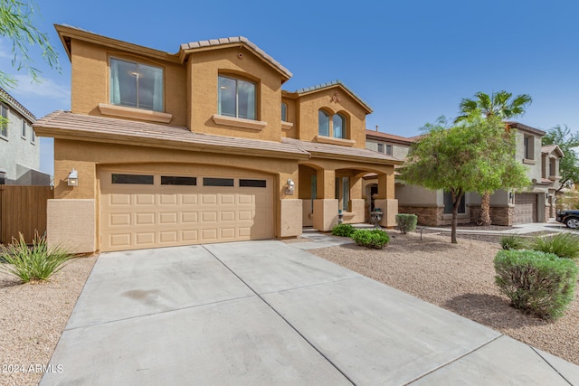 view of front of property with a garage