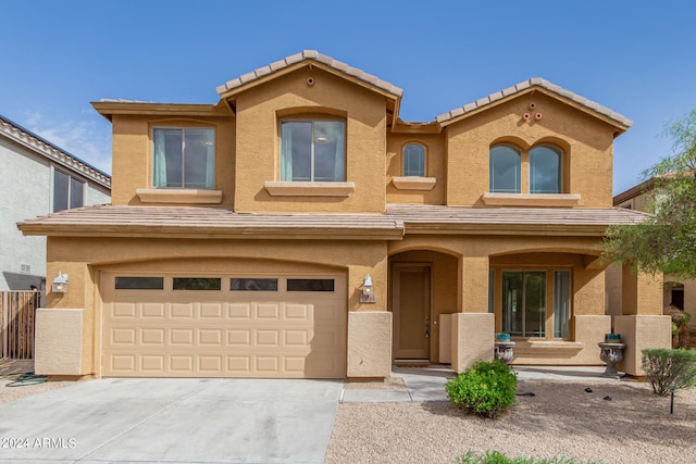 view of front of property featuring a garage