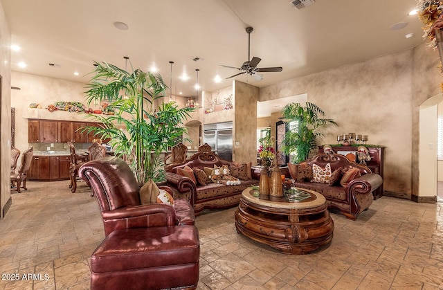 living room with ceiling fan