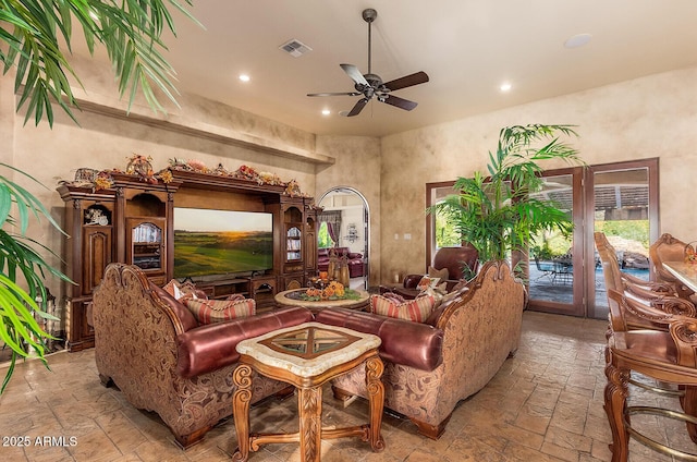 living room featuring ceiling fan