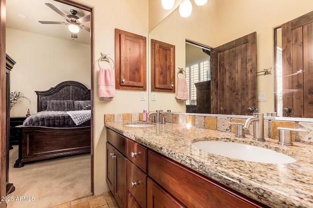 bathroom featuring vanity and ceiling fan