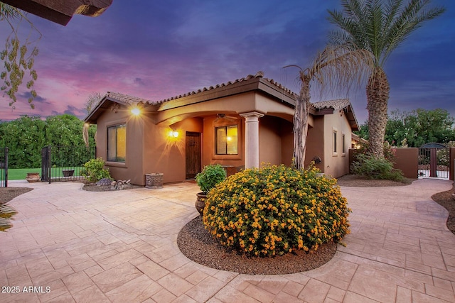 view of front of home with a patio area