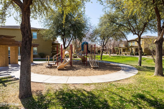 community play area with a lawn