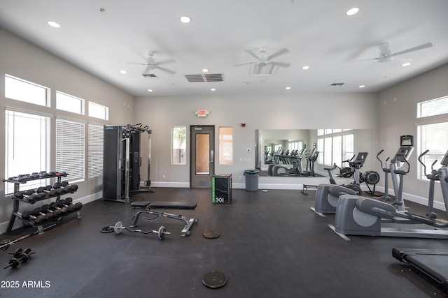 exercise room featuring baseboards, visible vents, and recessed lighting