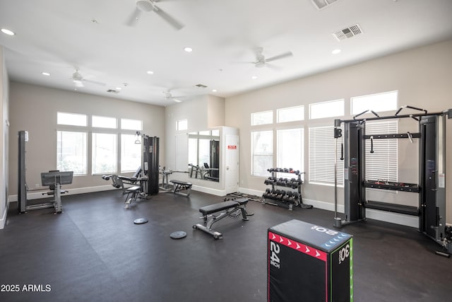 exercise room featuring a ceiling fan, recessed lighting, visible vents, and baseboards