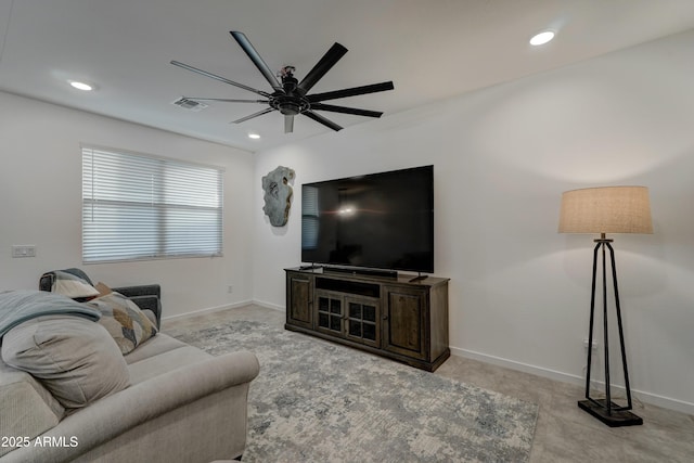 living room featuring ceiling fan