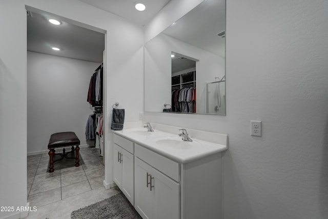 bathroom featuring vanity and tile patterned flooring