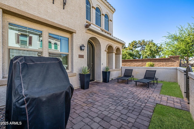 4077 S Sabrina Dr Unit 14, Chandler, AZ 85248 - view of patio / terrace with a fenced backyard and a grill
