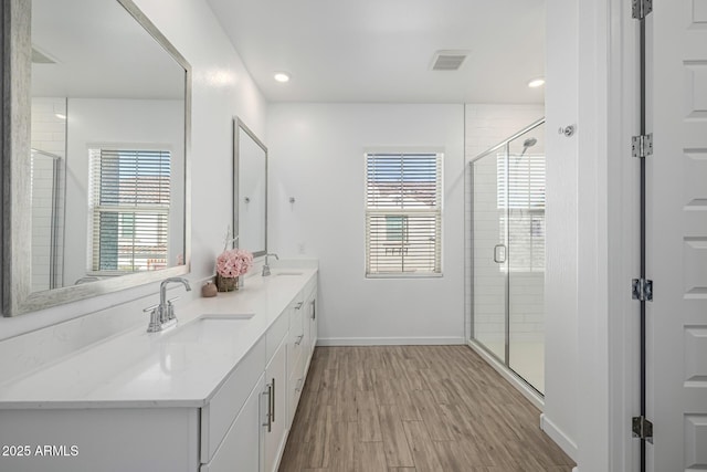 4077 S Sabrina Dr Unit 14, Chandler, AZ 85248 - full bathroom with a shower stall, wood finished floors, and a sink