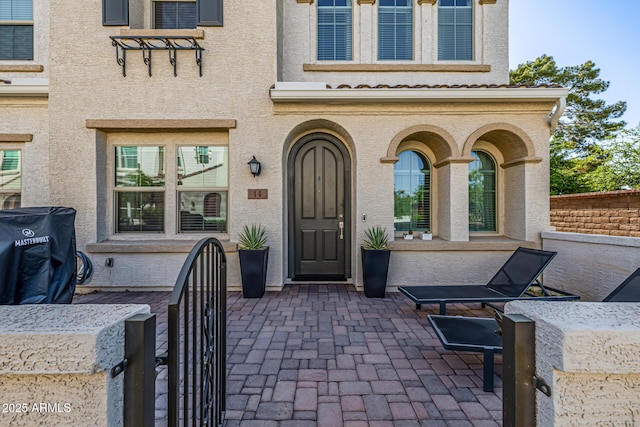 4077 S Sabrina Dr Unit 14, Chandler, AZ 85248 - doorway to property with a patio area and stucco siding