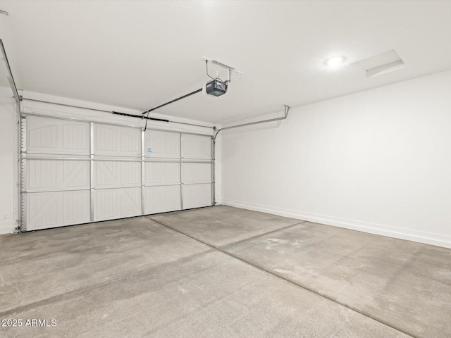 garage featuring a garage door opener