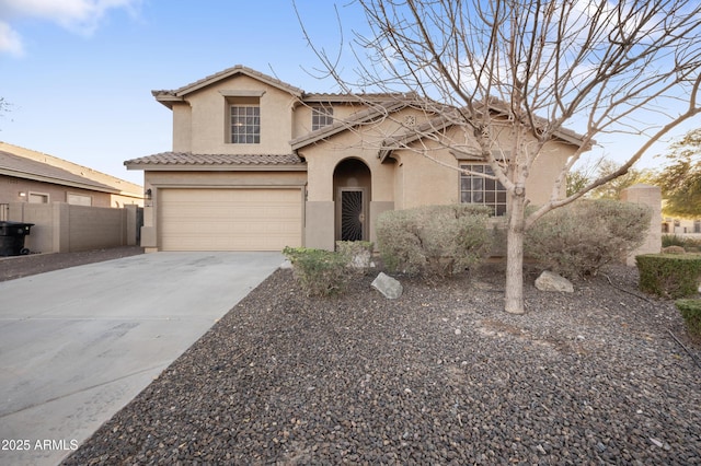 view of front of property with a garage