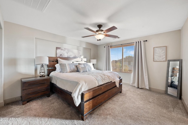 bedroom with ceiling fan and light carpet