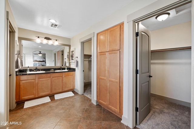 bathroom featuring vanity and tile patterned floors